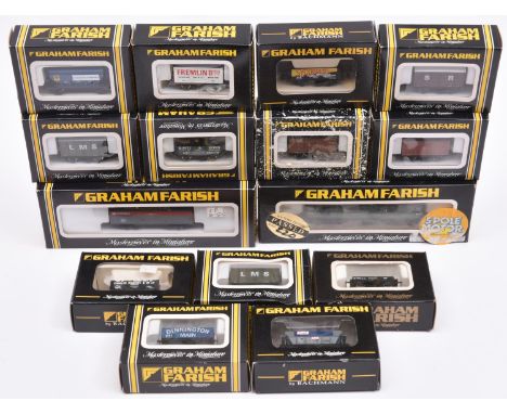 A quantity of Graham Farish N gauge railway. A BR Class 25 Bo-Bo diesel RN D 7645 in BR green. Plus 13 freight wagons includi
