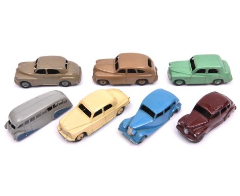 7 Dinky Toys. Hillman Minx in light green, Morris Oxford in beige, Triumph 1800 in mid blue, Standard Vanguard in tan, Austin