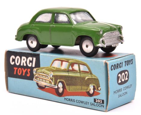 Corgi Toys Mechanical Morris Cowley Saloon (202M). An example in dark green with smooth spun wheels and black tyres. Boxed, a