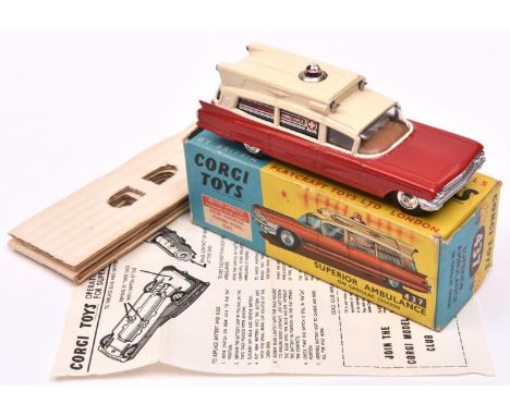 Corgi Toys Superior Ambulance (437). In red and cream with red light to roof, complete with battery pack, dished spun wheels 