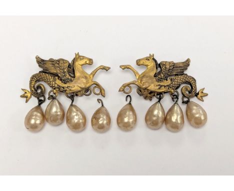Henkel &amp; Grosse for Christian Dior. C.1950. A pair of gilt metal clip on earrings with pearl droplets.