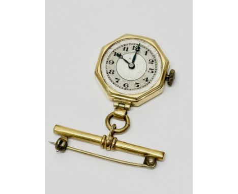 A vintage 9ct gold Dennison watch