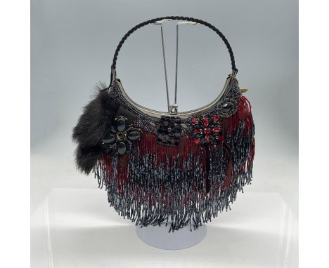 Fabulous frame top bag in burgundy, red, black and gray tones. Beautiful sparkling bugle bead fringe adorns the entire bag. T
