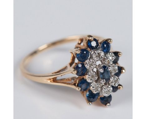 This beautiful ring has 8 round diamonds that are 0.05ct and 11 sapphires that are 0.50ct set in 10K yellow gold. The band is