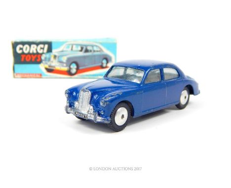 A Corgi Toys Riley Pathfinder Saloon 205M in dark blue with original box (missing one flap).