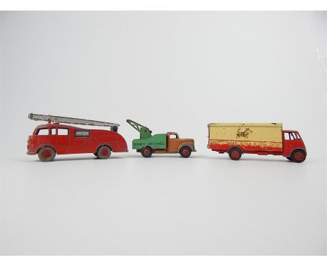 A vintage Dinky Commer Service truck together with two Dinky Supertoys model Fire Engine (955) and Guy Spratt's delivery van 