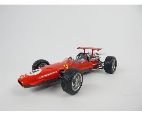 A Schuco tinplate wind up, Ferrari Formula 2 racing car (1968 type) with key, spanner and original box. 