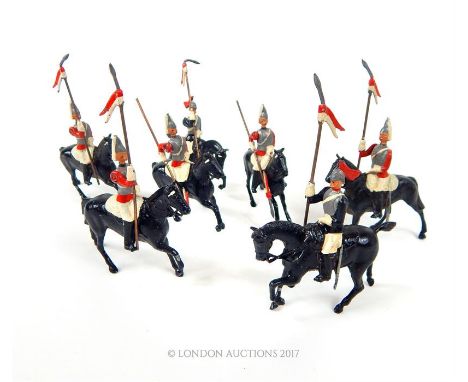 Seven vintage Britains lead toy British army mounted cavalry; a/f.