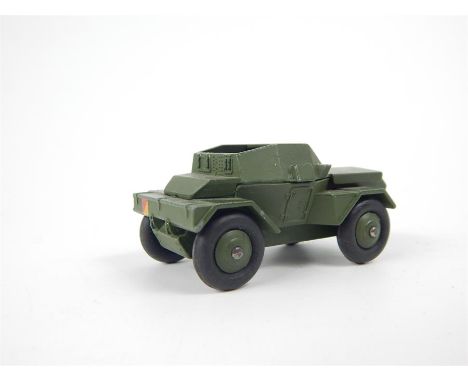 A Dinky Toys Army Scout Car (673) with original box.