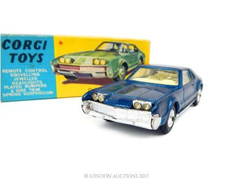 A Corgi Toys Oldsmobile Tornado 264, with rare smooth shaped wheel hubs, with original box and Corgi Model Club News applicat