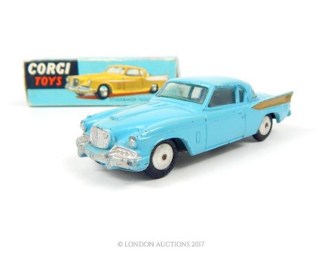 Corgi Toys Studebaker "Golden Hawk" 211 in pale blue with plain wheel hubs and original box (sellotape to one end).