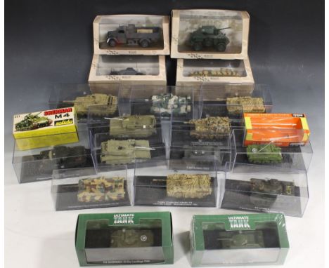 FOUR BOXED ATLAS EDITIONS DIECAST MILITARY VEHICLES, two Atlas Ultimate Tank Collection tanks together with a boxed collectio