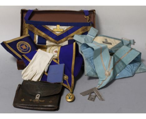 A MASONIC 'WORCESTERSHIRE' APRON CUFFS AND SASH, in leather case, along with another Masonic apron etc.Buyers - for shipping 