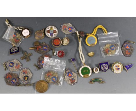 A COLLECTION OF ENAMEL BADGES AND FOBS, to include 1970s Uttoxeter race course passes, dancing fobs etc.Buyers - for shipping