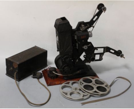 A PATHÉ 9.5 MM CINE PROJECTOR, with reel of film and spare reelBuyers - for shipping pricing on this lot, visit www.cuttlesto