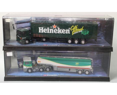 TWO BOXED 1:50 SCALE CORGI 'MODERN TRUCKS' - HEINEKEN AND B.P., together with a boxed 1:32 scale truckBuyers - for shipping p