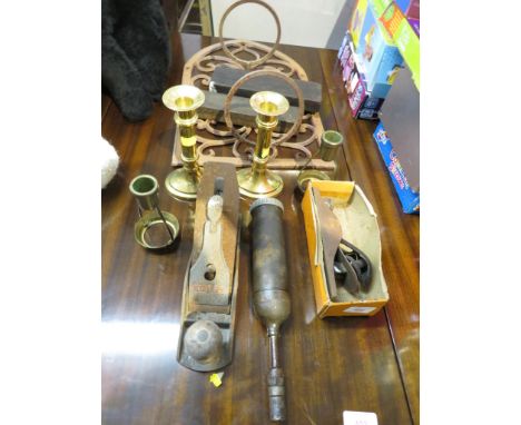 CAST METAL WALL BRACKET , BRASS CANDLE STICKS , WOOD PLANES AND OTHER METAL WARE. *
