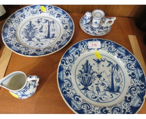 TWO BLUE AND WHITE PATTERNED LEAD GLAZED PLATES , BLUE AND WHITE PORCELAIN CHAMBER STICK AND A MINIATURE JUG (A/F)