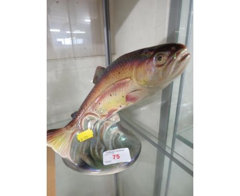 CERAMIC FIGURE OF A LEAPING FISH MARKED JEMA HOLLAND TO BASE.