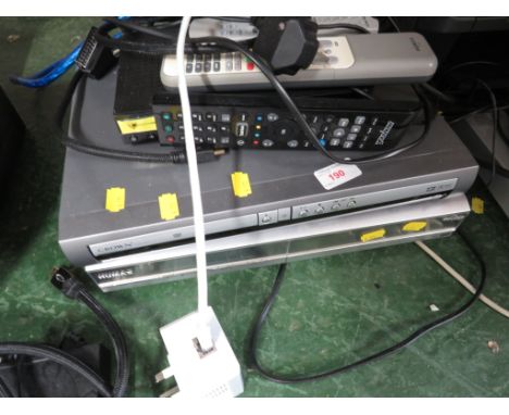 HUMAX TV RECORDER , CROWN DVD PLAYER AND A HUAWEI DIGI BOX (THREE REMOTES) .