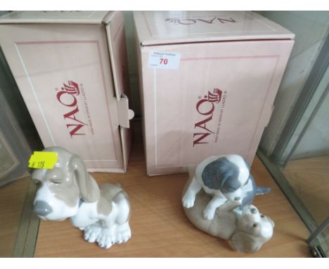 NAO PORCELAIN FIGURE OF A SEATED DOG TOGETHER WITH A NAO FIGURAL GROUP OF PUPPIES BOTH WITH BOXES.&nbsp;