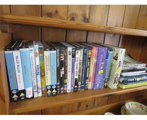 SELECTION OF DVDS AND BOOKS (ONE SHELF)