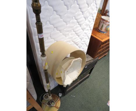 BRASS EFFECT AND ONIX FLOOR LAMP TOGETHER WITH THREE ASSORTED LAMP SHADES. *