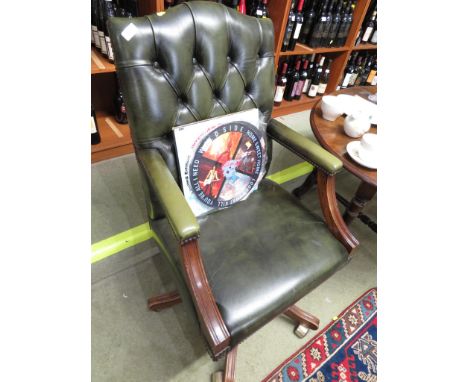 BRIGHTS OF NETTLEBED MAHOGANY SWIVEL DESK CHAIR WITH GREEN BUTTON BACK LEATHERETTE COVERS.