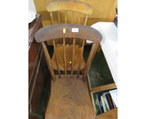 PAIR OF STAINED ELM STICK BACK CHAIRS.