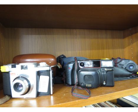 KODAK COLOUR SNAP 35 FILM CAMERA WITH CASE , A FUJI DL800 FILM CAMERA WITH CARRY BAG AND A PAIR OF 10X25 BINOCULARS.