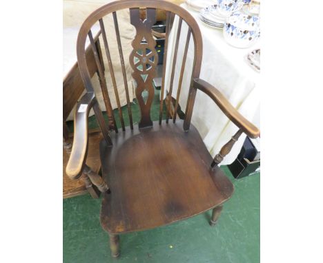 DARK ELM STICK BACK CARVER CHAIR. *