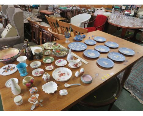 RECTANGULAR HONEY PINE DINING TABLE TOGETHER WITH A MATCHED SET OF SIX LIGHT WOOD FRAMED DINING CHAIRS.