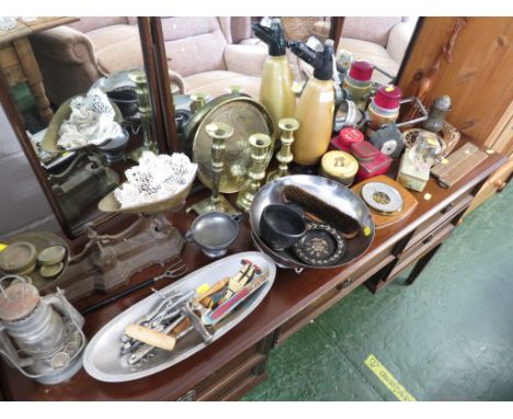 SELECTION OF VINTAGE HOME WARE INCLUDING SCALES , BRASS CANDLE STICKS , SODA SYPHON , COMMERCIAL TINS AND OTHER ITEMS.