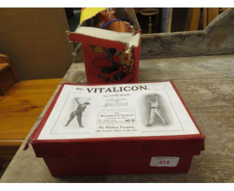 BOXED VITALICON EXERCISE ROPE TOGETHER WITH A BOXED VINTAGE CLOWN TOY.
