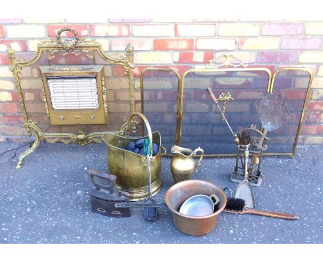 BELLING STYLE 2 KW ELECTRIC FIRE MOUNTED ON A FRENCH STYLE GILT BRASS FIRESCREEN WITH FLAMBEAU FINIALS, ON FOUR HOOF FEET (H.