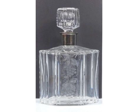AMERICAN HEAVY CUT GLASS DECANTER OF HEXAGONAL FORM WITH ENGRAVED FRUITING VINE DECORATION AND A METAL MOUNTED CRACKED NECK S