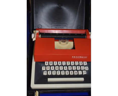 Cased Petite Deluxe International typewriter