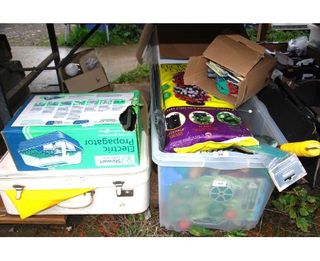 Garden gloves, shears, a flower tower. tools. etc. plus an electric propagator, etc.