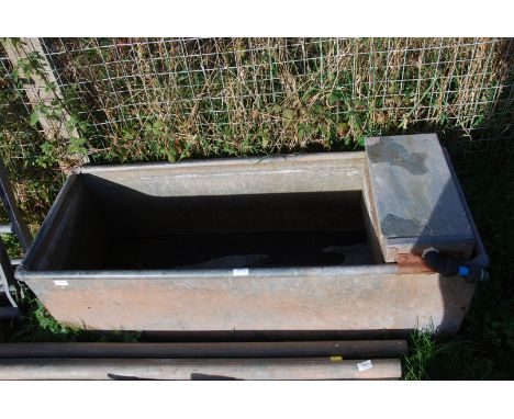 A galvanized water trough, 49" long x 19" depth x 16" high.