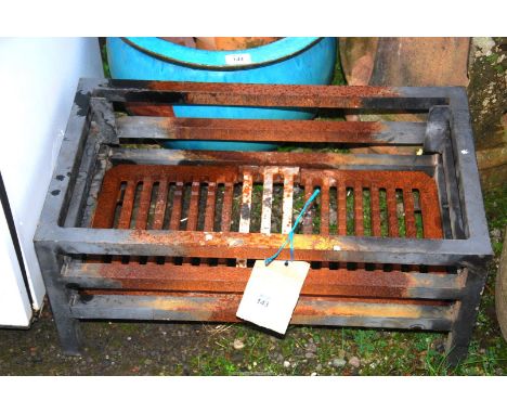 A fire grate, 23" wide x 13" depth x 9 1/2" high.