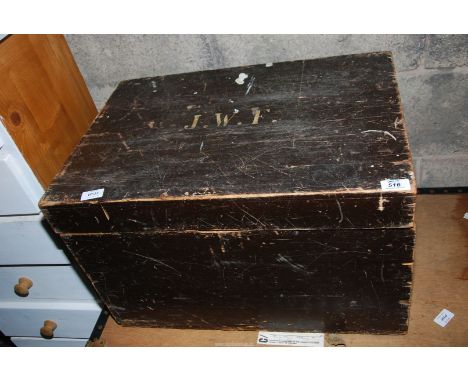A wooden trunk with JWS to the lid, 2' wide x 17" depth x 15" high.