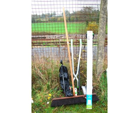 A wide broom 30" wide, course brush, dirt buddy, new blind, two shears and stop cock tap.