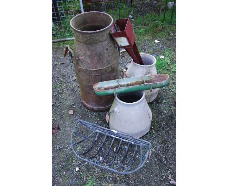 A steel milk churn (a/f) and two aluminum dump buckets.