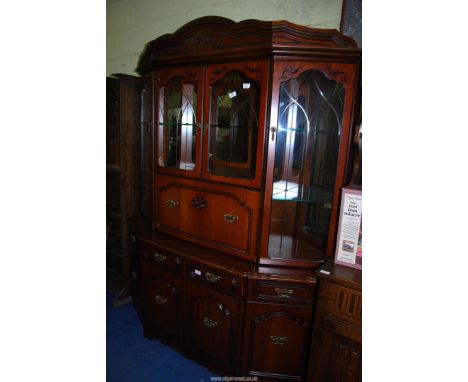 A modern glass top drinks unit/display cabinet, 5' x 79" high.