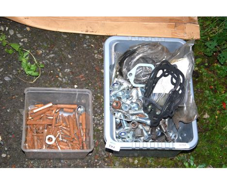 A quantity of large nuts/bolts, various gaskets, screwdriver bits, etc.