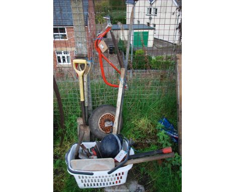 A quantity of gardening and building tools.