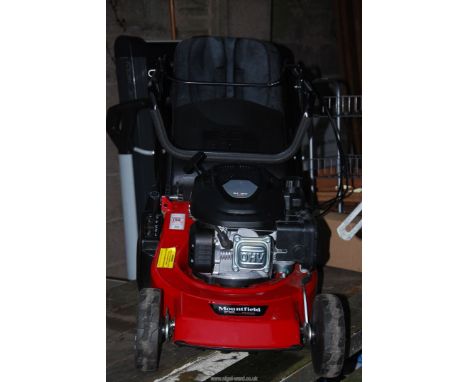 A propelled Mountfield mower with roller, Tiga ST120 overvalve engine, good working order.