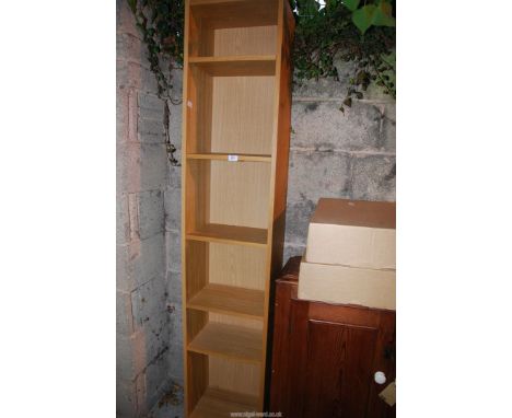 A shelf unit, 6" wide x 79 1/2" high x 11" depth.