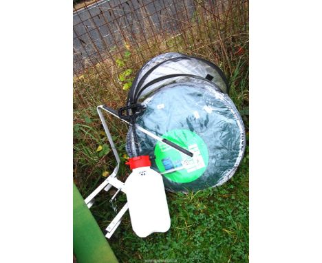 "Tesco" garden bags, a ladder stand off and a garden sprayer.