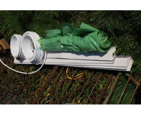 A quantity of cavity closers, underfloor 16mm heating pipe and a roll of vapour barrier.